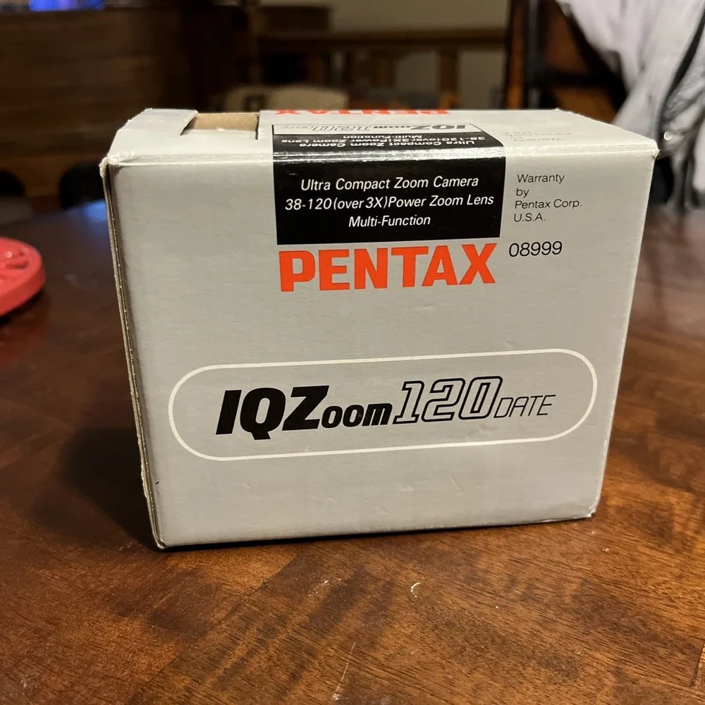 PENTAX IQZOOM 120 DATE 35MM AUTOFOCUS CAMERA WITH 38-120 ZOOM LENS, IN BOX